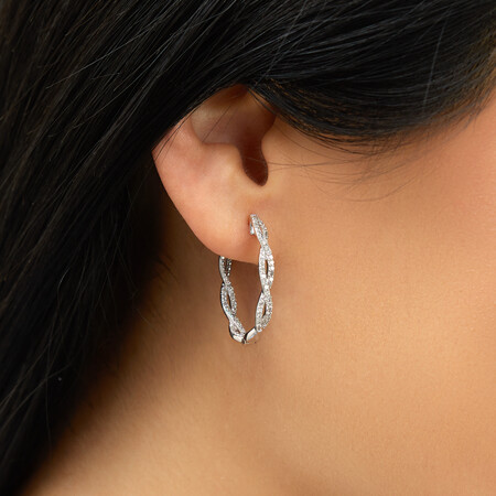 Twist Huggie Earrings with 0.50 Carat TW of Diamonds in Sterling Silver Twist Huggie Earrings with 0.50 Carat TW of Diamonds in Sterling Silver