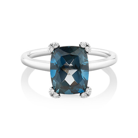 Ring with Blue Topaz & Diamonds In 10kt White Gold Ring with Blue Topaz & Diamonds In 10kt White Gold