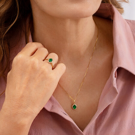 Halo Ring with Created Emerald & Diamonds in 10kt Yellow Gold Halo Ring with Created Emerald & Diamonds in 10kt Yellow Gold