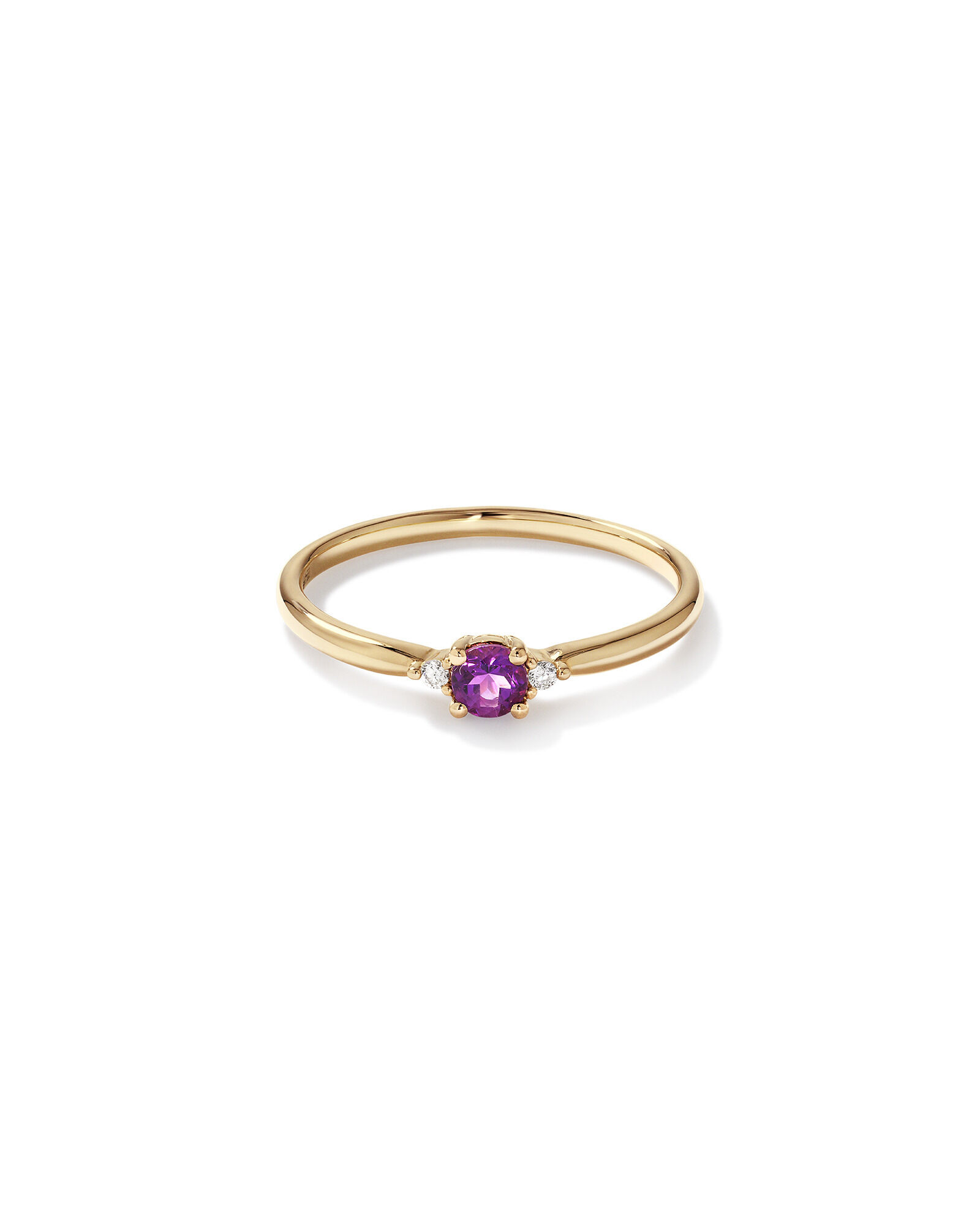White gold ring with purple stone top