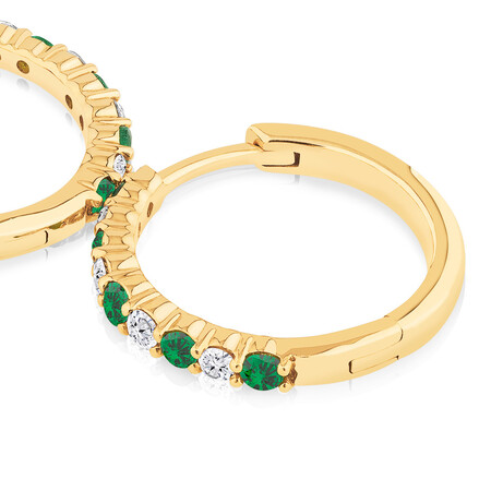 Huggie Earrings with Emerald & 0.20 Carat TW of Diamonds in 10kt Yellow Gold Huggie Earrings with Emerald & 0.20 Carat TW of Diamonds in 10kt Yellow Gold