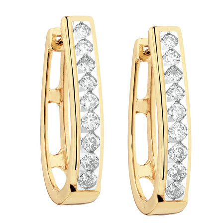 Huggie Earrings with 1/2 Carat TW of Diamonds ih 10kt White Gold Huggie Earrings with 1/2 Carat TW of Diamonds ih 10kt White Gold