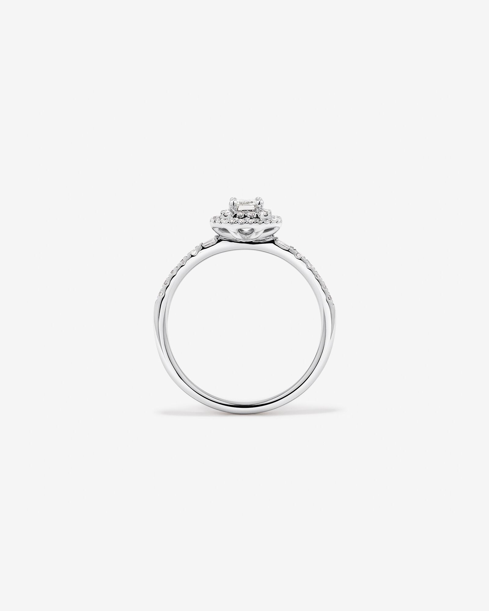 0.55 Carat TW Emerald Diamond Halo Baguette Side Accent Engagement Ring in 14kt White Gold
