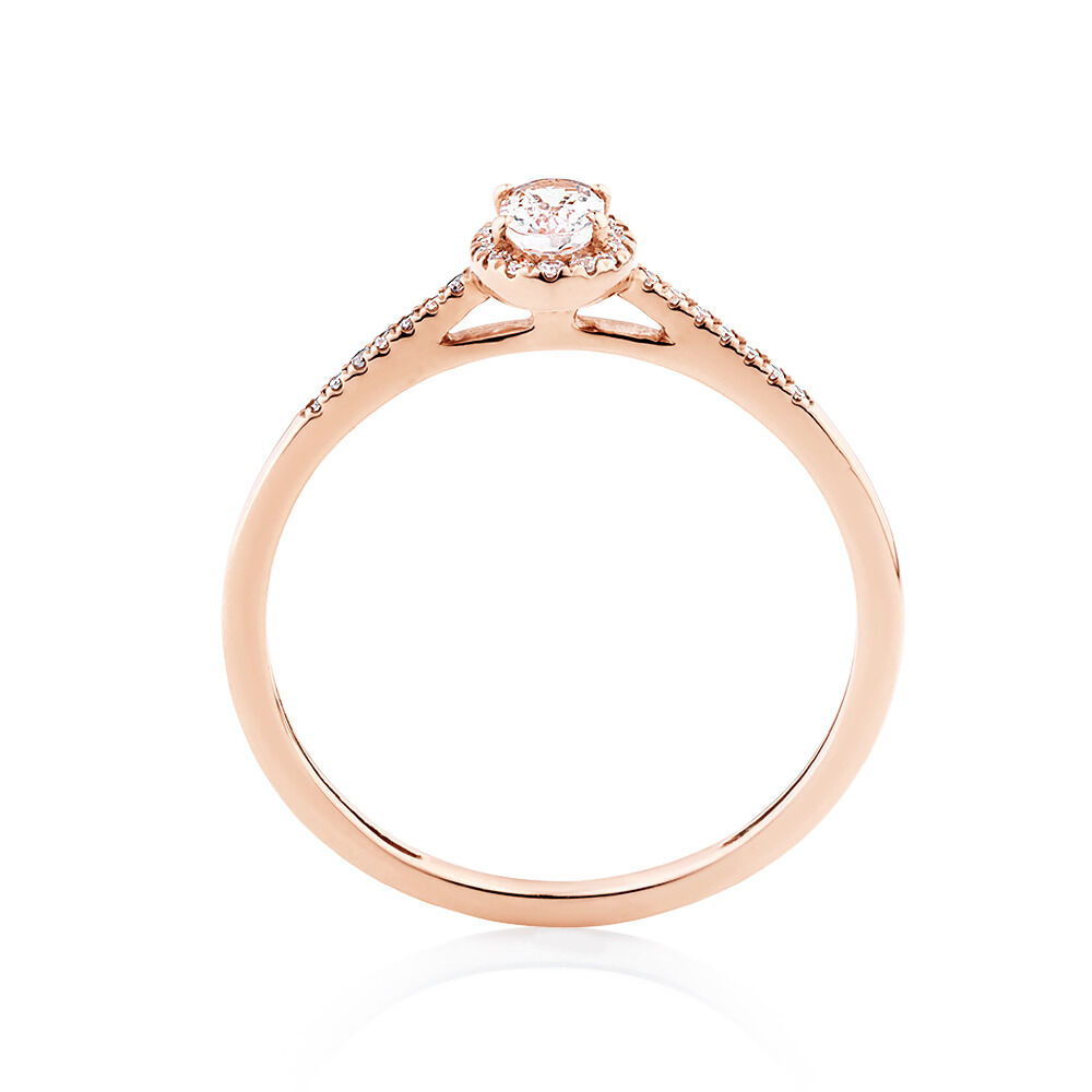 halo ring with diamonds morganite in 10kt rose gold