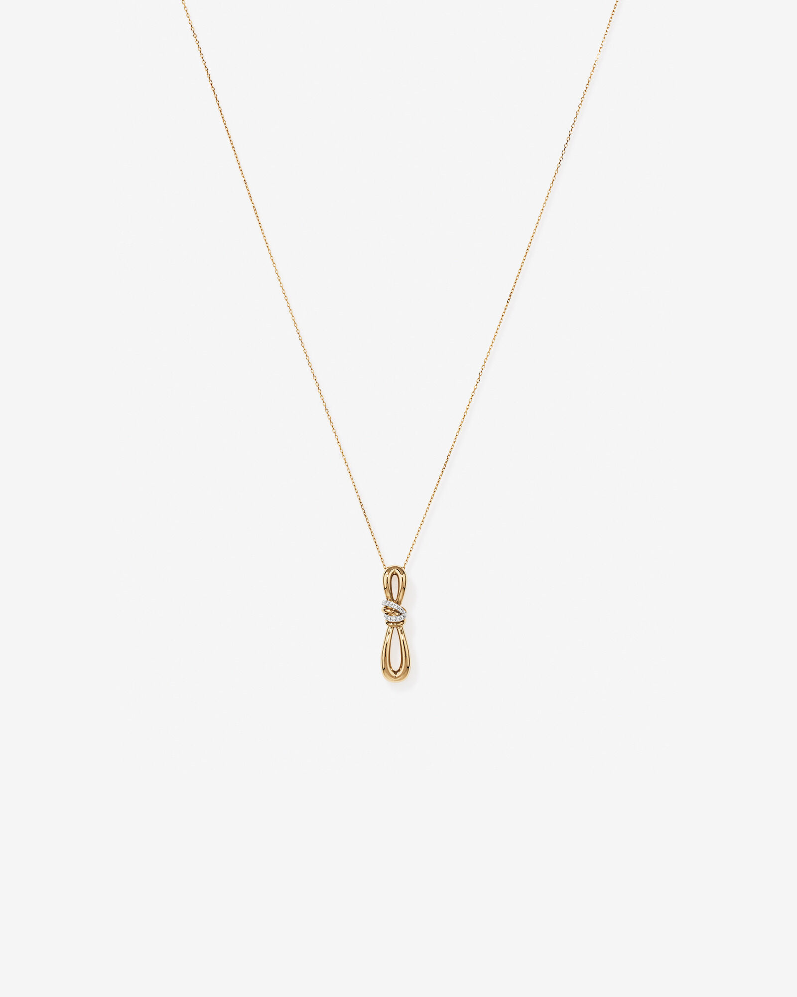 0.07 Carat TW Diamond Knots Pendant in 10kt Yellow Gold