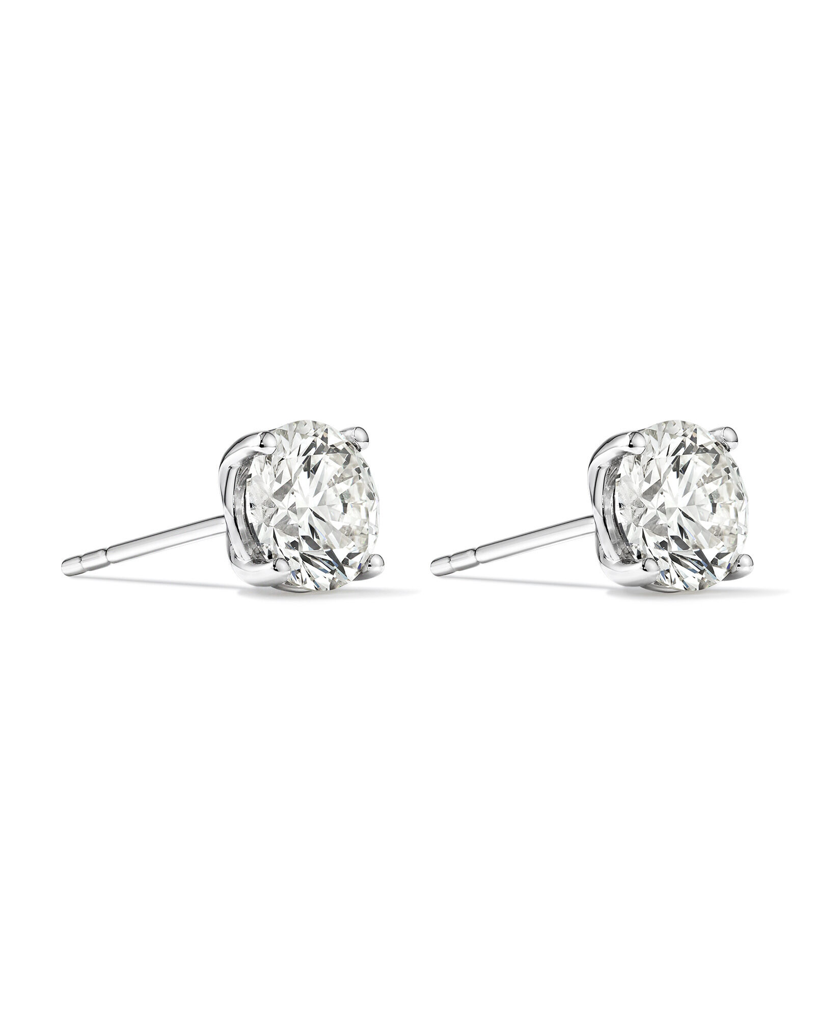 White gold solitaire earrings store