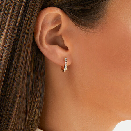 Huggie Earrings with 0.25 Carat TW of Diamonds in 10kt Yellow Gold Huggie Earrings with 0.25 Carat TW of Diamonds in 10kt Yellow Gold