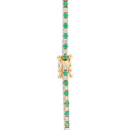 Tennis Bracelet with Emerald and 1 Carat TW of Diamonds in 10kt Yellow Gold Tennis Bracelet with Emerald and 1 Carat TW of Diamonds in 10kt Yellow Gold