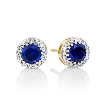 Halo Stud Earrings with Laboratory Created Sapphire & 0.18 Carat TW of Natural Diamonds in 10kt Yellow Gold Halo Stud Earrings with Laboratory Created Sapphire & 0.18 Carat TW of Natural Diamonds in 10kt Yellow Gold