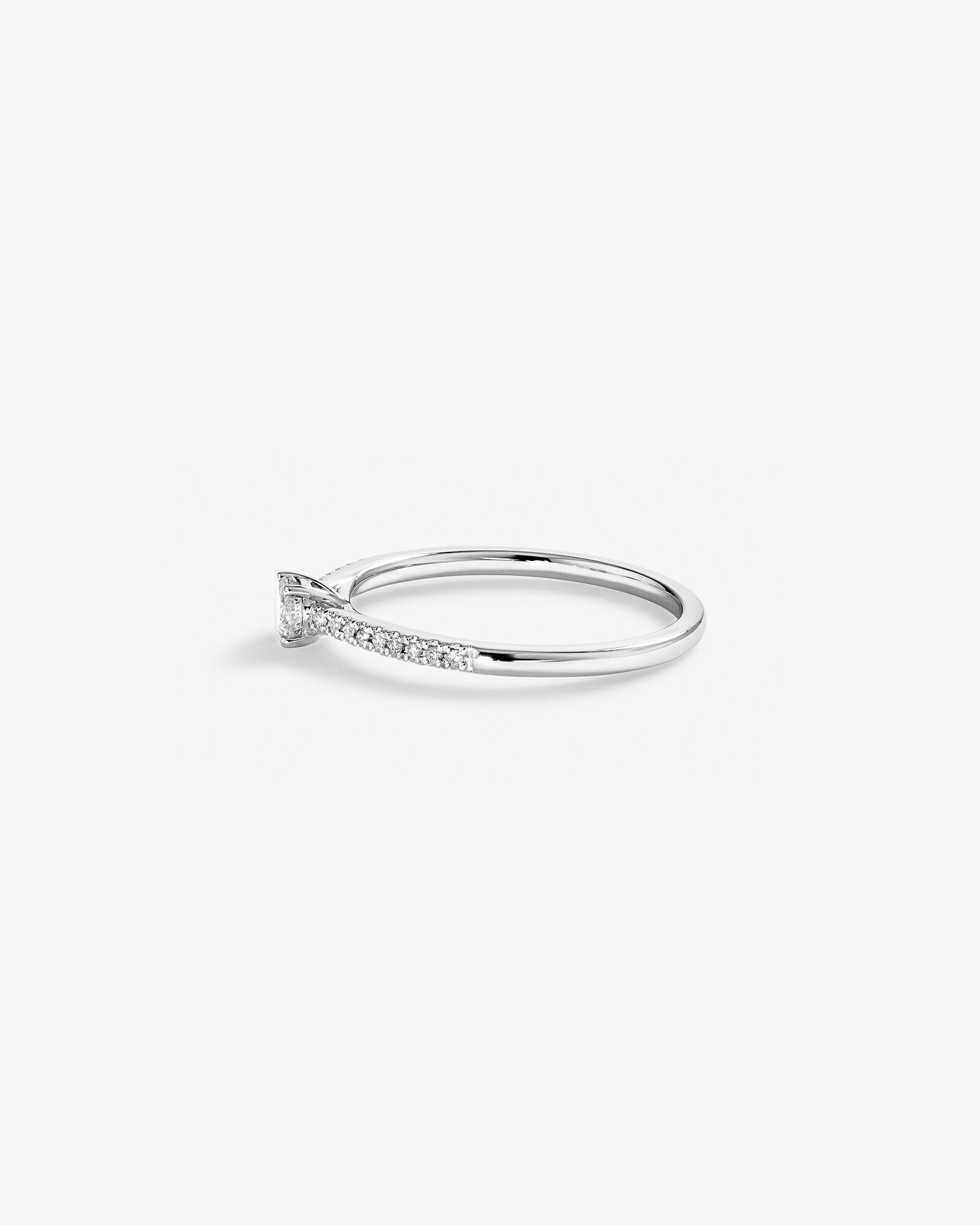 0.25 Carat TW Round Brilliant Diamond Side Accent Engagement Ring in 14kt White Gold