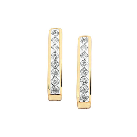 Huggie Earrings with 1/3 Carat TW of Diamonds in 10kt Yellow Gold Huggie Earrings with 1/3 Carat TW of Diamonds in 10kt Yellow Gold