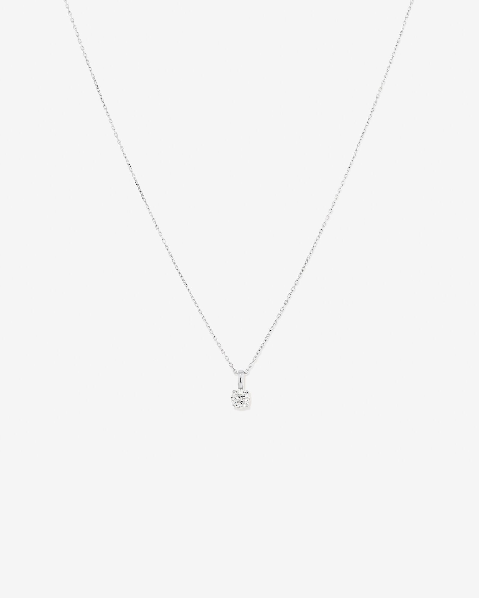 0.25 Carat TW Diamond Solitaire Pendant in 18kt Gold
