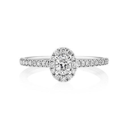 Oval Halo Ring with 0.50 Carat TW of Diamonds in 14kt White Gold Oval Halo Ring with 0.50 Carat TW of Diamonds in 14kt White Gold