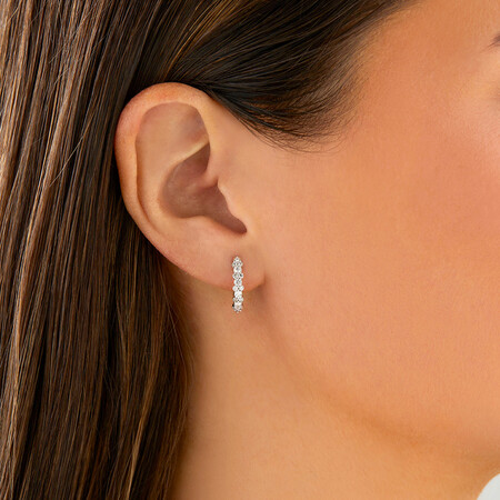 Huggie Earrings with 0.50 Carat TW of Diamonds in 10kt White Gold Huggie Earrings with 0.50 Carat TW of Diamonds in 10kt White Gold