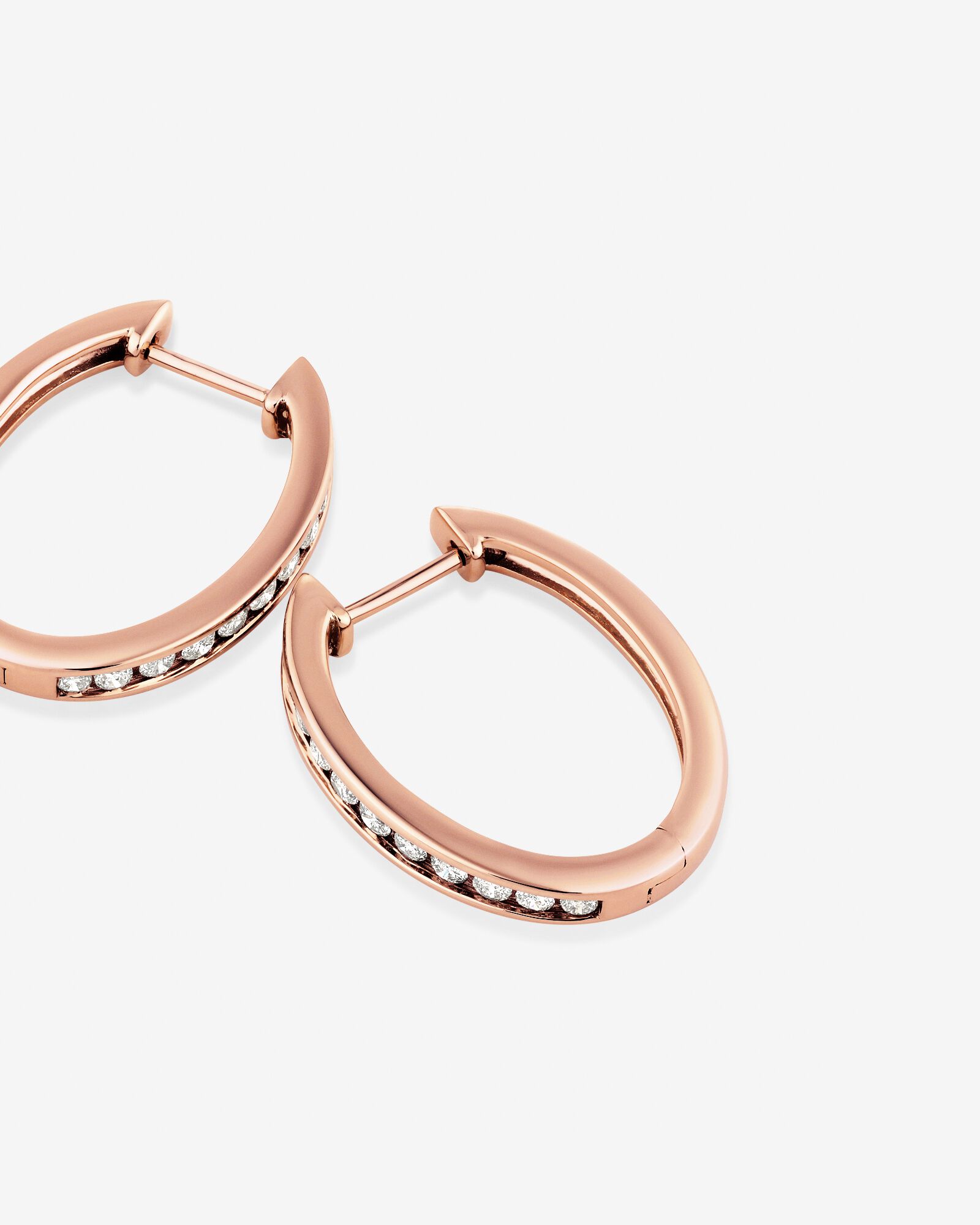 Huggie Earrings with 0.50 Carat TW of Diamonds 10kt Rose Gold