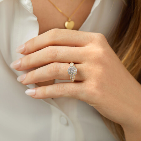 Round Halo Ring with 1.0 Carat TW of Diamonds in 10kt Yellow Gold Round Halo Ring with 1.0 Carat TW of Diamonds in 10kt Yellow Gold