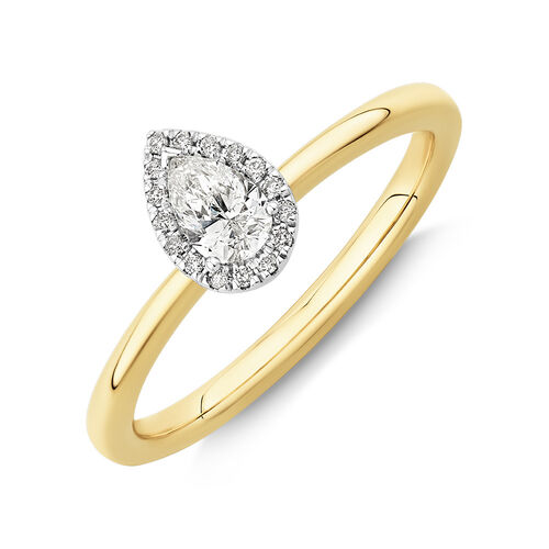 0.31 Carat TW Pear Cut Diamond Halo Engagement Ring in 14kt Yellow and White Gold
