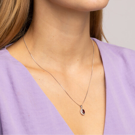 Halo Pendant with Garnet and 0.04 TW of Diamonds in Sterling Silver Halo Pendant with Garnet and 0.04 TW of Diamonds in Sterling Silver