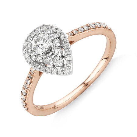 Evermore Halo Pear Engagement Ring with 0.45 Carat TW Diamonds in 10kt Rose & White Gold Evermore Halo Pear Engagement Ring with 0.45 Carat TW Diamonds in 10kt Rose & White Gold