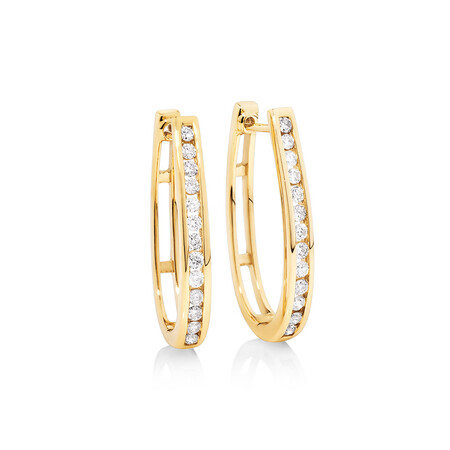 Huggie Earrings 0.50 Carat TW of Diamonds in 10kt Yellow Gold Huggie Earrings 0.50 Carat TW of Diamonds in 10kt Yellow Gold