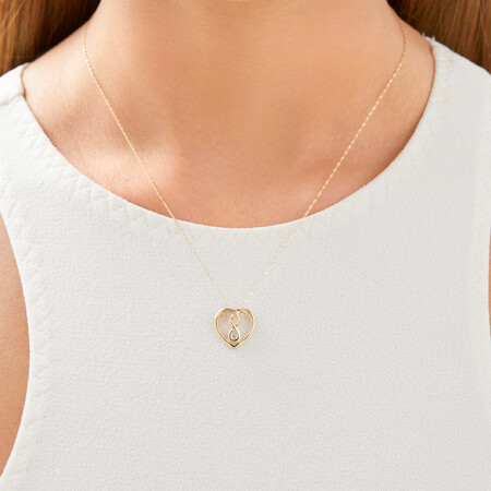 Small Infinitas Pendant with Diamonds in 10kt Yellow Gold Small Infinitas Pendant with Diamonds in 10kt Yellow Gold
