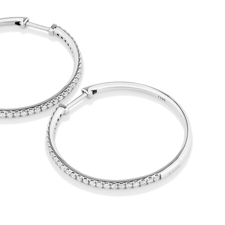 Huggies with 0.60 Carat TW of Diamonds in 10kt White Gold Huggies with 0.60 Carat TW of Diamonds in 10kt White Gold