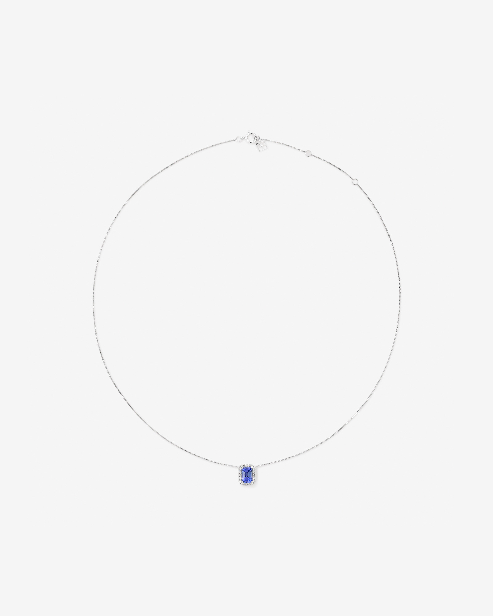 Emerald Cut Blue Tanzanite and 0.17 Carat TW Diamond Halo Pendant in 14kt White Gold