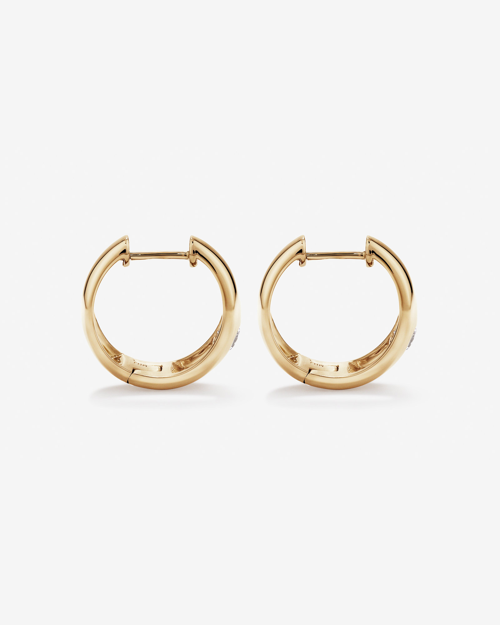 0.24 Carat TW of Laboratory-Grown Round Brilliant Diamond Huggie Earrings in 10kt Yellow Gold