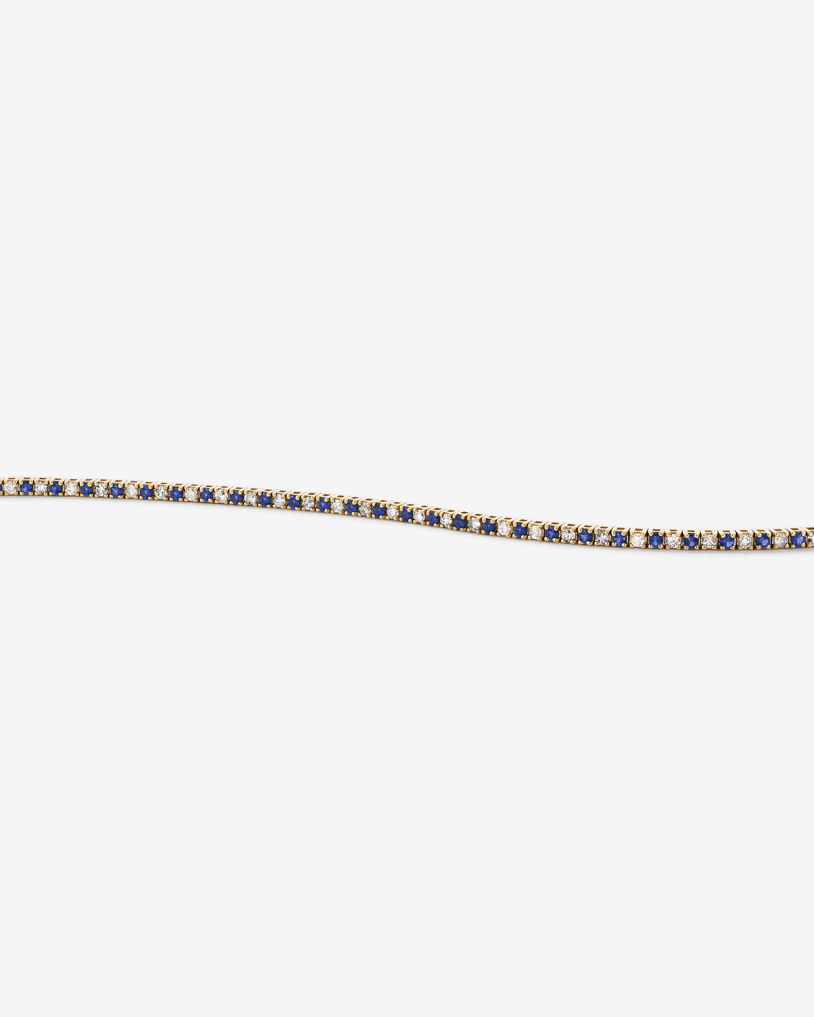 Bracelet tennis en or jaune 10 kt avec diamants de 0,68 carat TW et saphirs créés