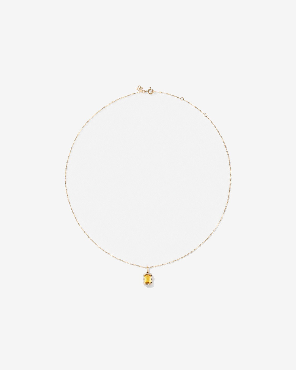 Pendentif avec chaîne en or jaune 10 carats : citrine taille émeraude et halo de diamants