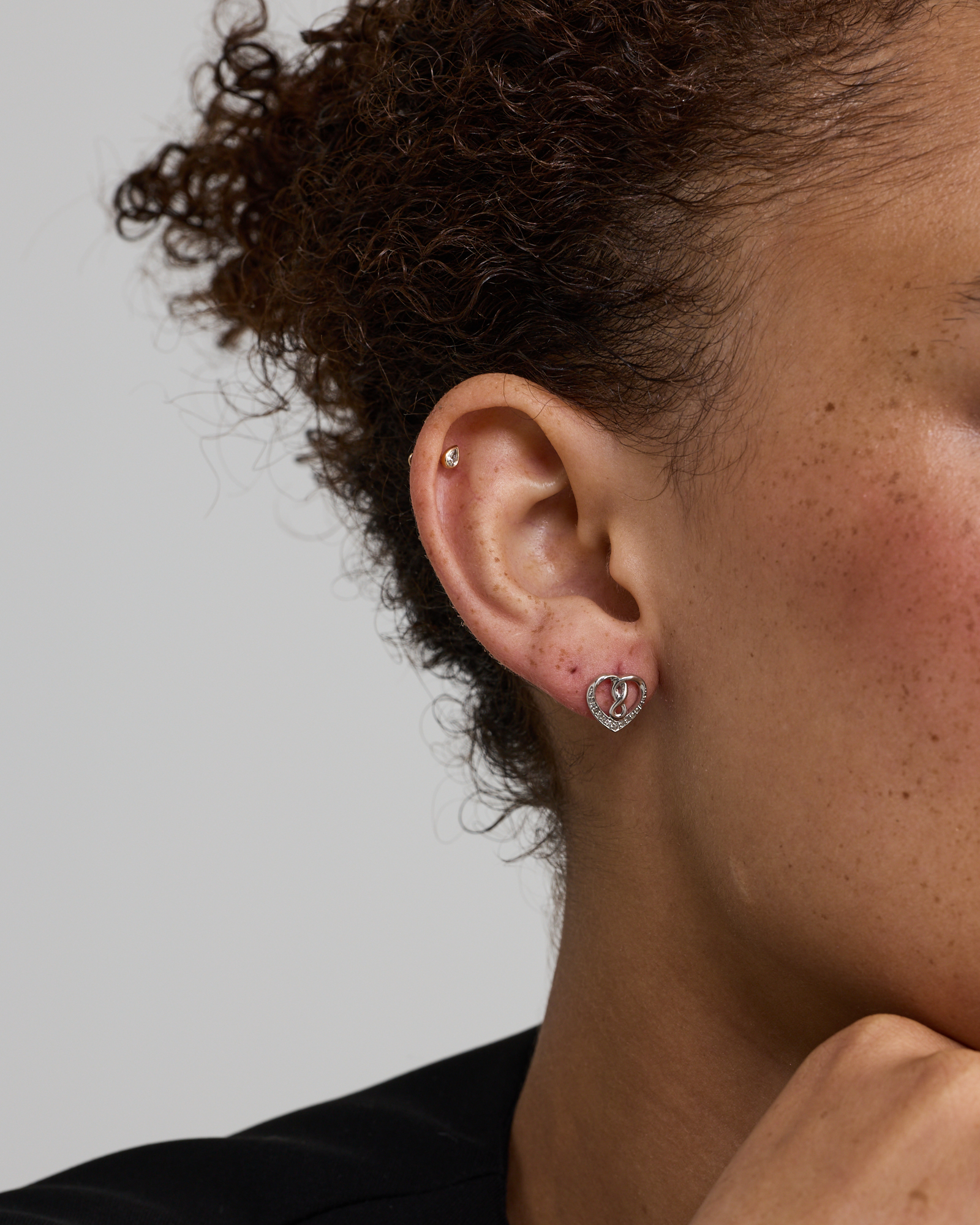 Heart infinitas Earring with 0.12 Carat TW of Diamonds in Sterling Silver