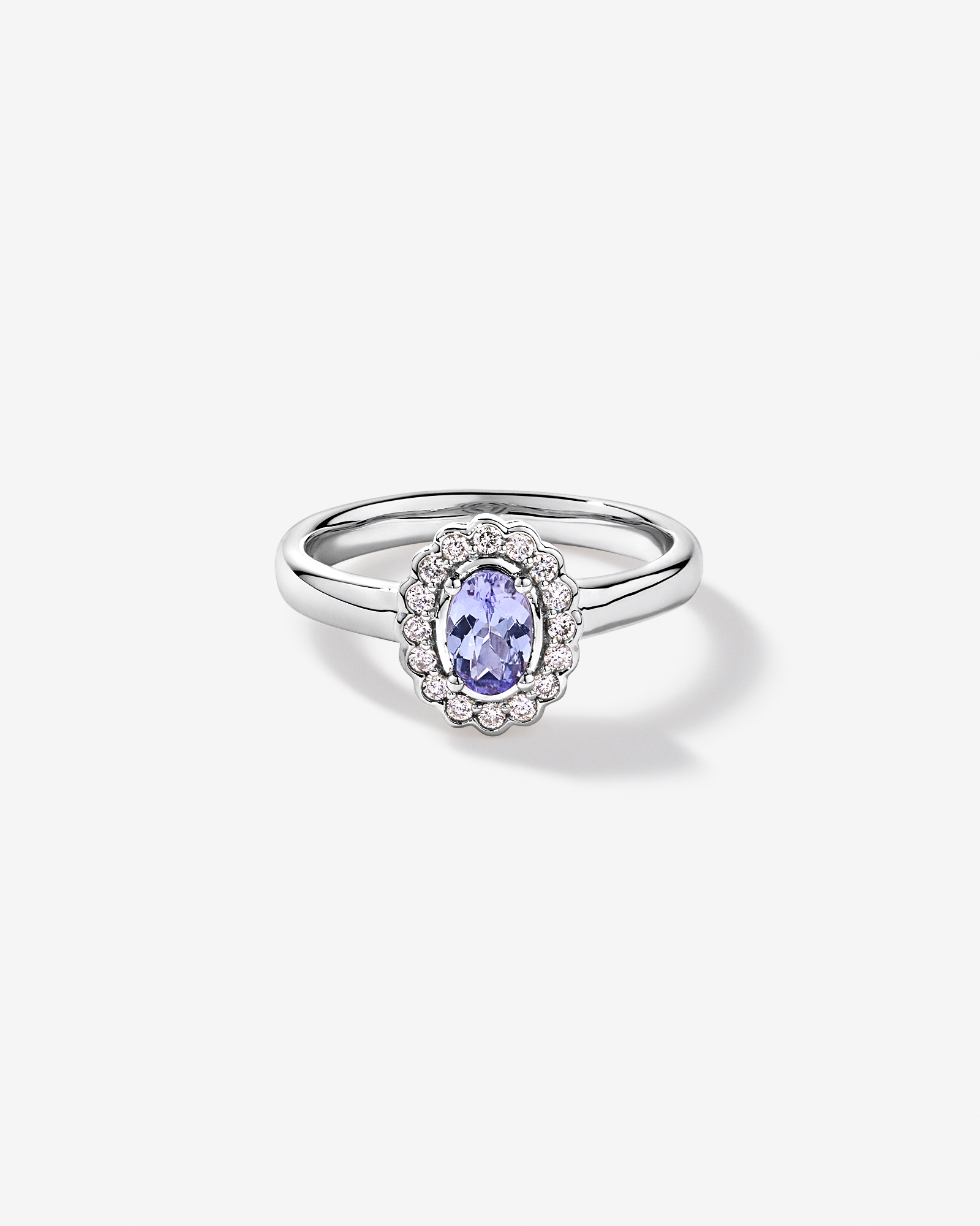 Tanzanite & 0.15TW of Diamond Halo Ring 10kt White Gold
