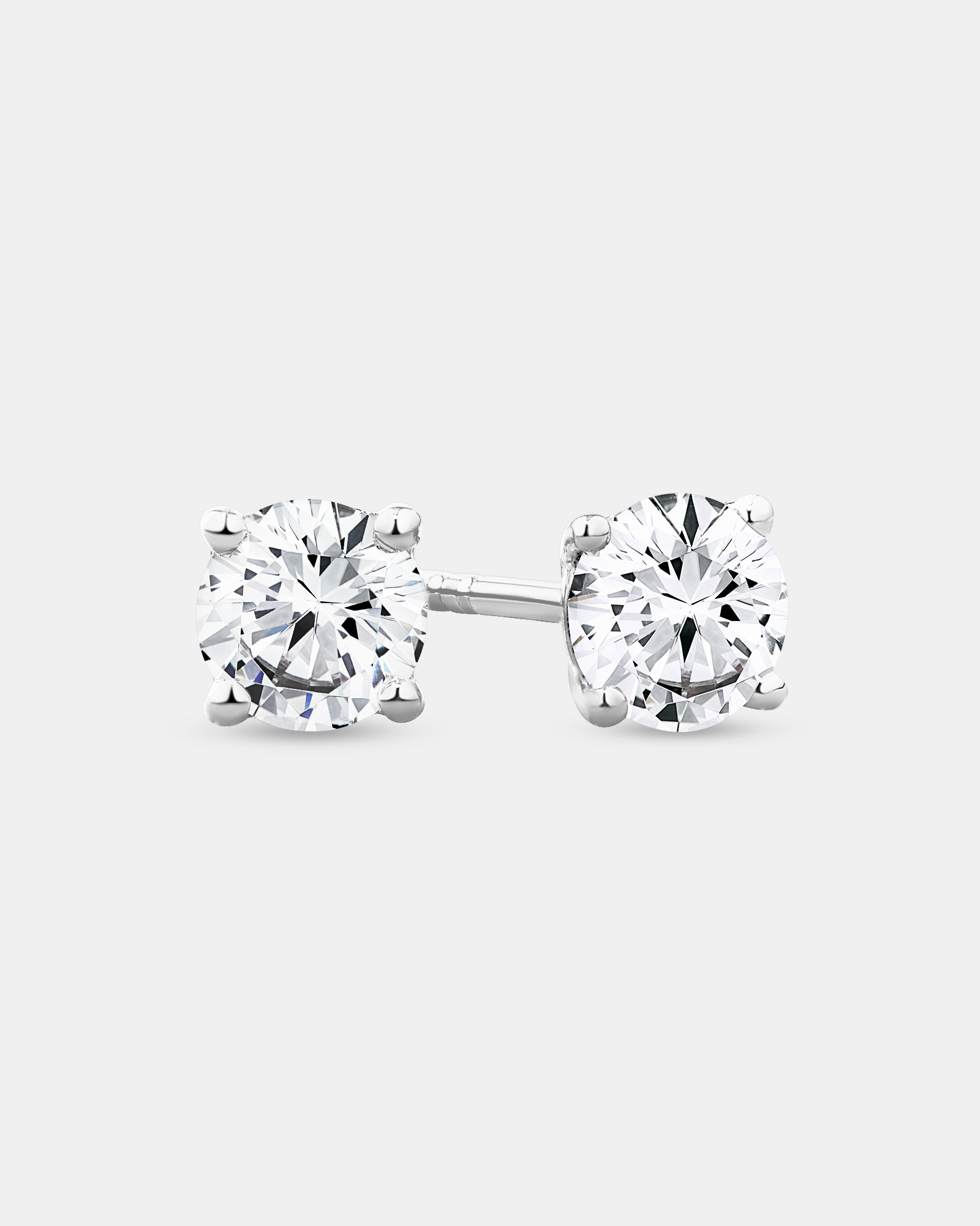 0.75 Carat TW Diamond Solitaire Stud Earrings 18kt Yellow Gold