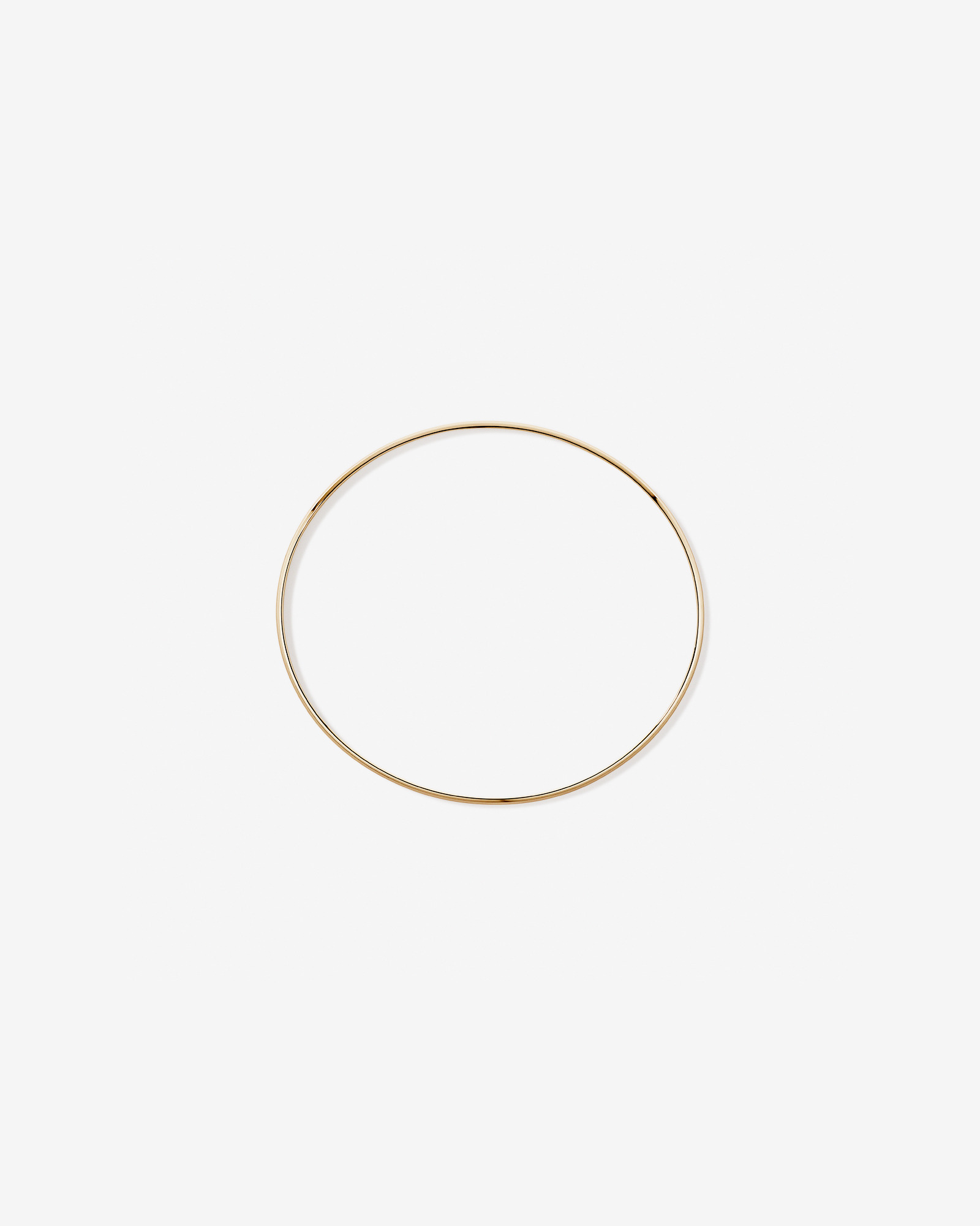 65mm (2.5") 2.3mm Width Solid Oval Bangle in 10kt Yellow Gold