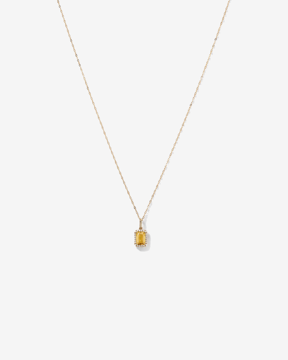 Emerald Cut Citrine and Diamond Halo Pendant with Chain in 10kt Yellow Gold