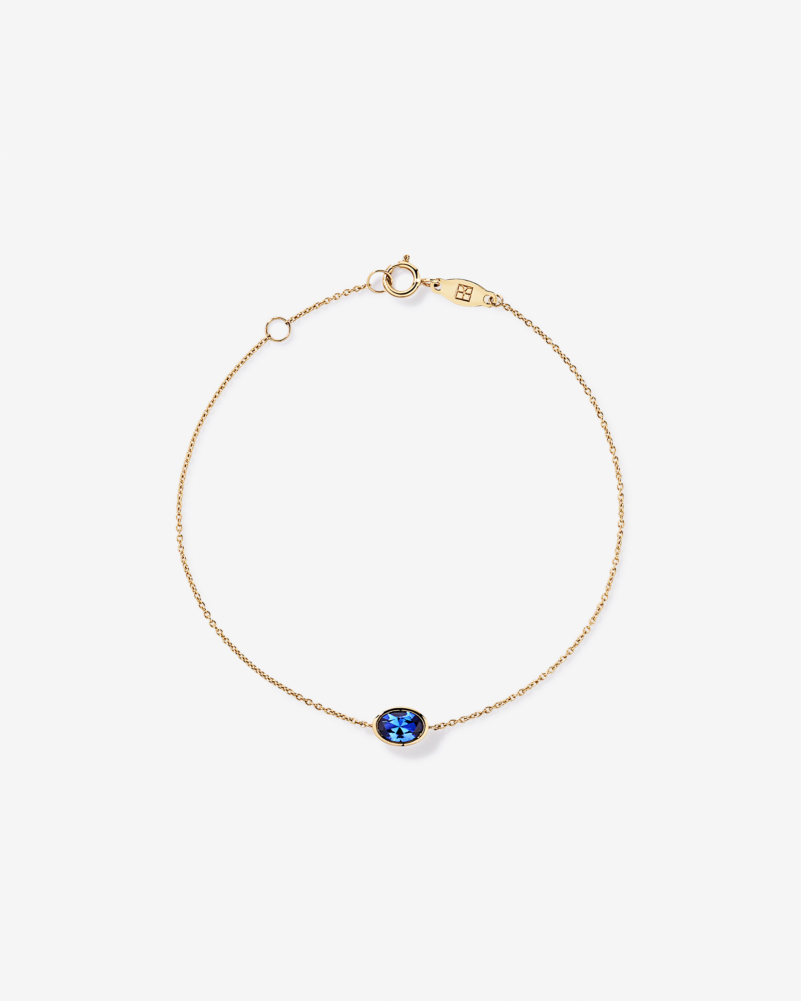 A créé un bracelet saphir bleu en or jaune 10 carats