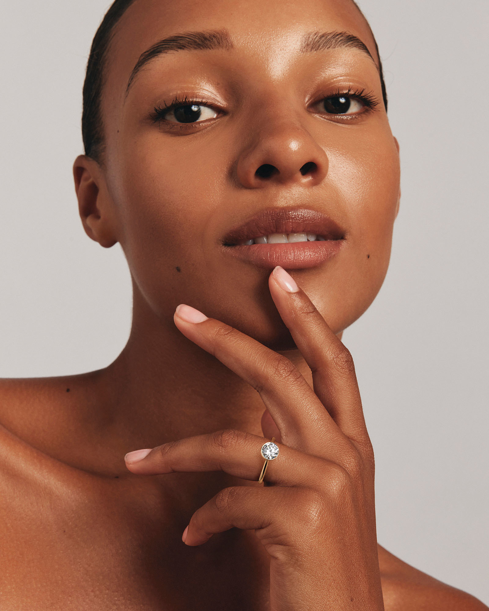 1.25 Carat TW Round Brilliant Laboratory-Grown Diamond Solitaire Bezel Set Engagement Ring 14kt Yellow Gold