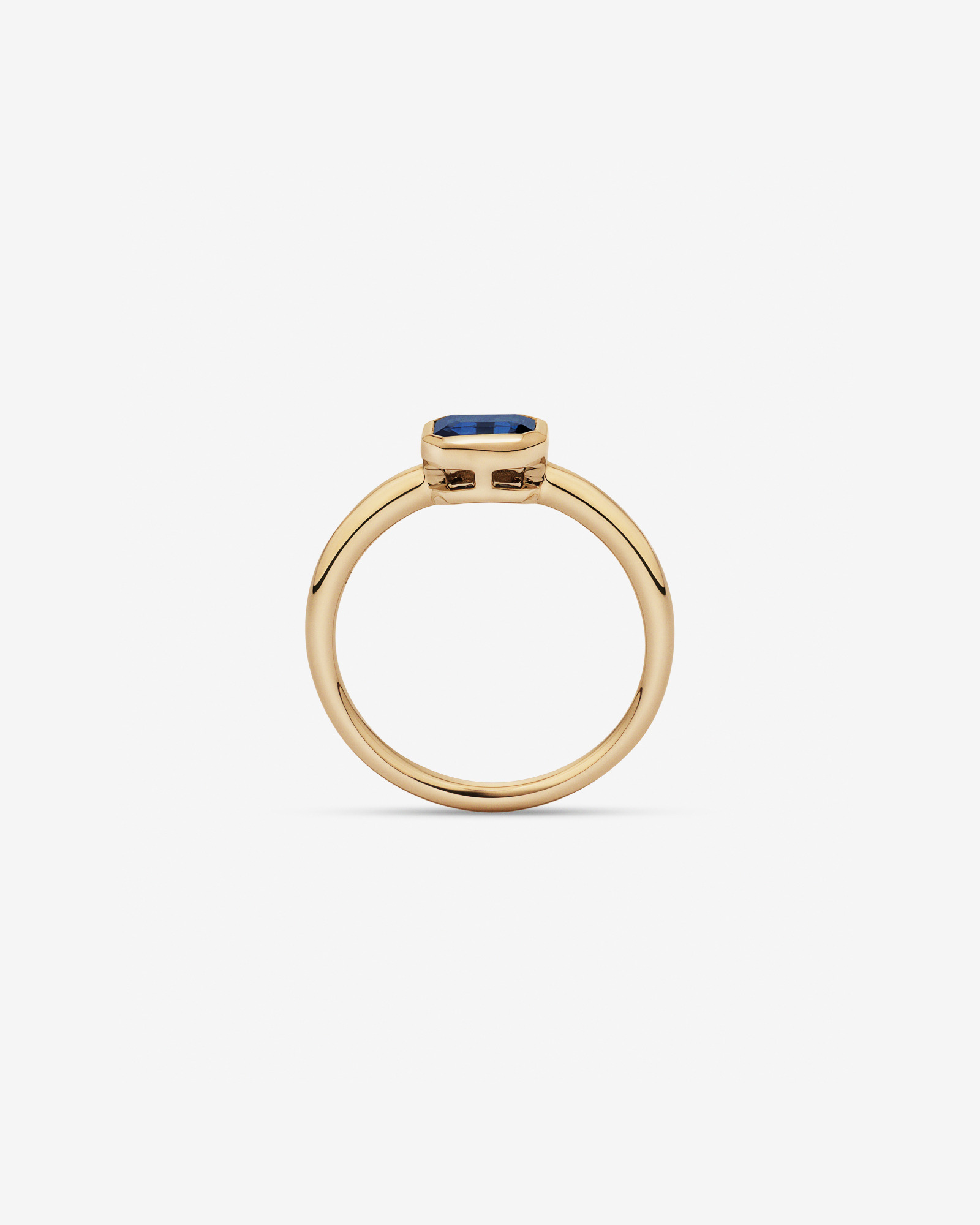Bague sertie de lunette à lunettes émeraude en saphir australien or jaune 10 carats