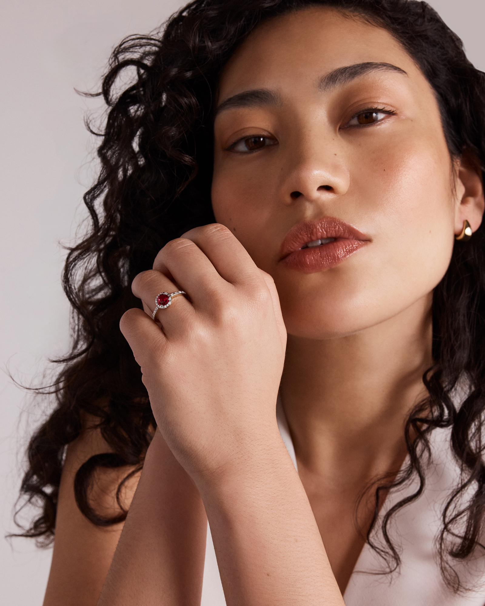 Round Cut Red Created Ruby and Lab-Grown Diamond Halo Ring in 10kt Yellow Gold and Rhodium