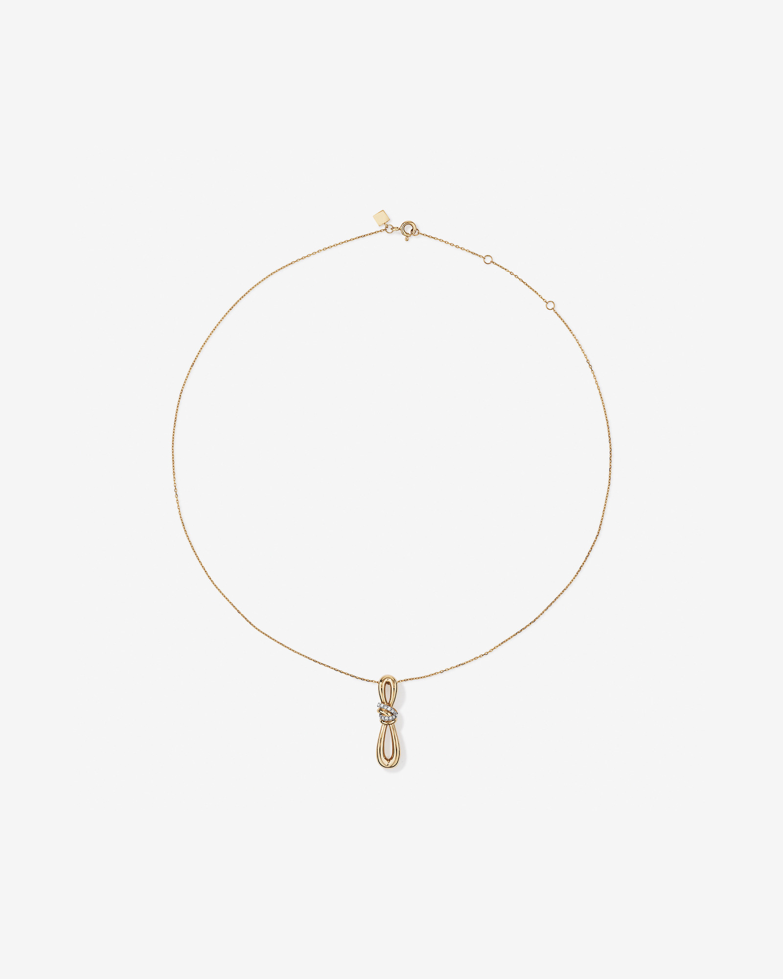 0.07 Carat TW Diamond Knots Pendant in 10kt Yellow Gold