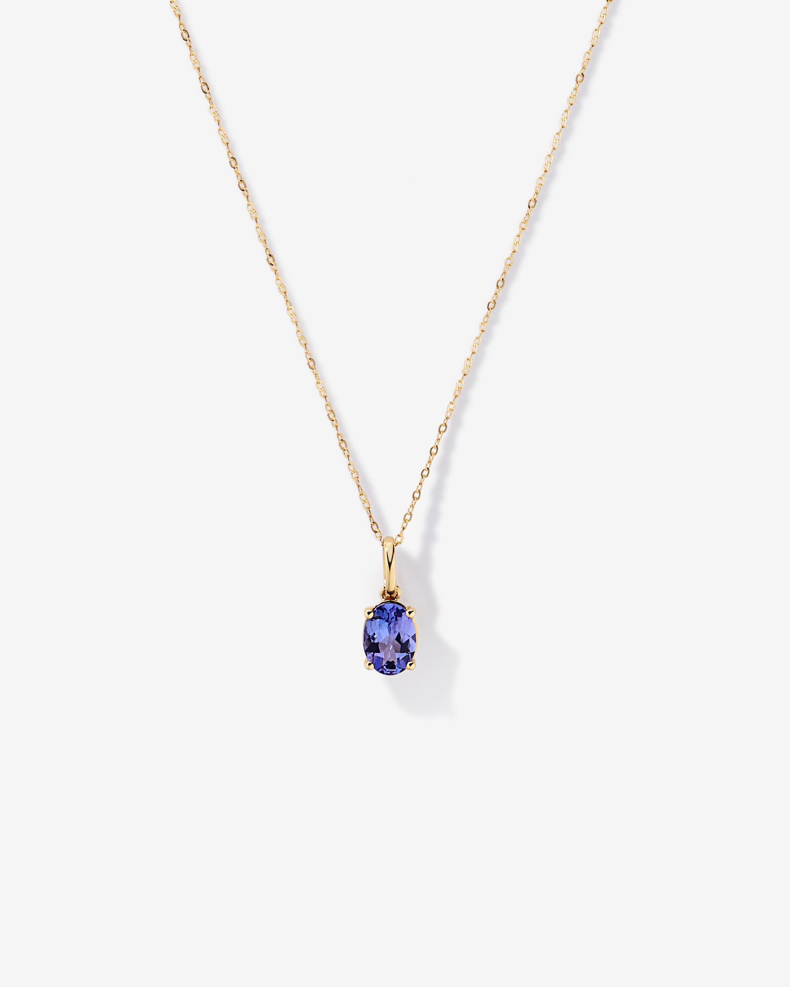 Tanzanite Solitaire Pendant With Chain in 10kt Yellow Gold