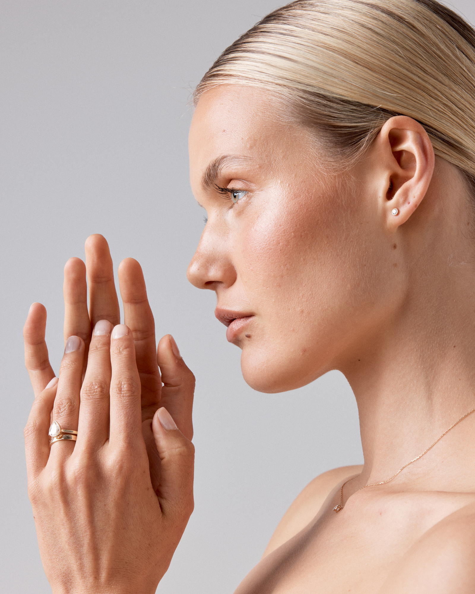 0.25 Carat TW Round Brilliant Diamond Solitaire Bezel Set Stud Earrings 18kt White Gold