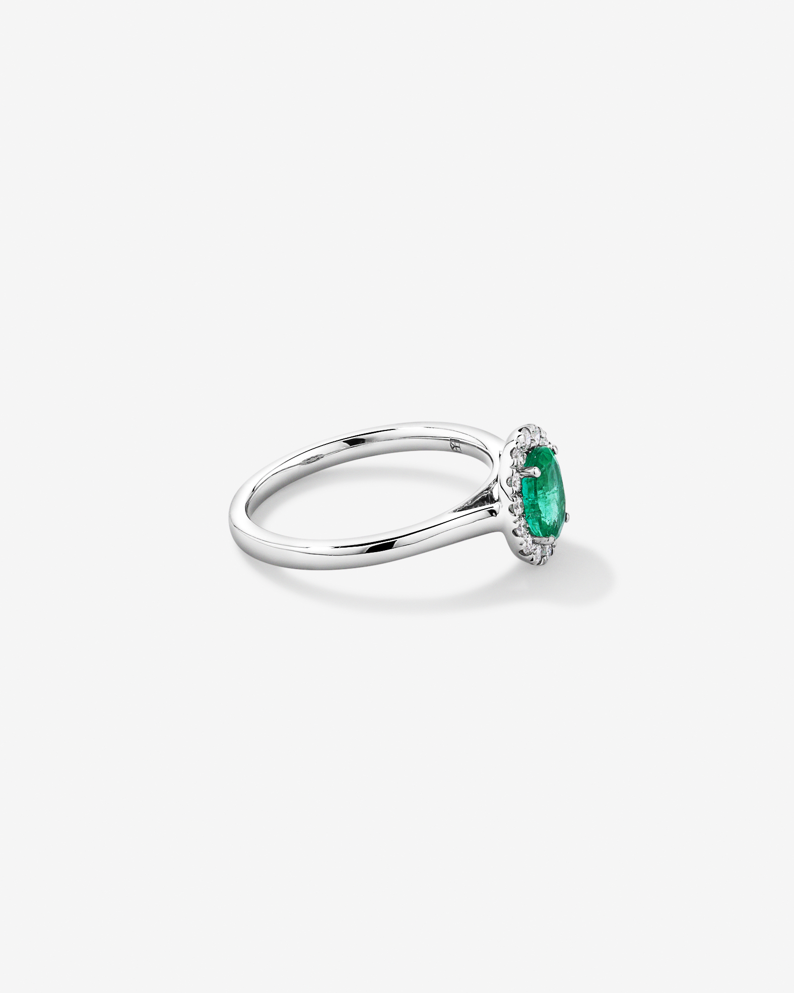 0.25 Carat TW Oval Emerald and Diamond Ring in Recycled Platinum