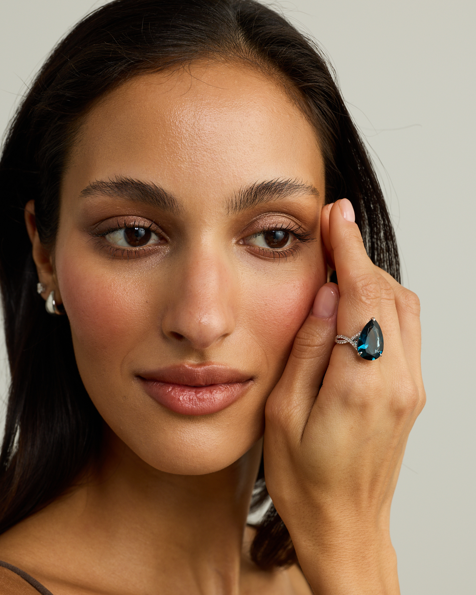 Pear Cut London Blue Topaz & 0.28 Carat TW Diamond Twist Ring 10kt Gold