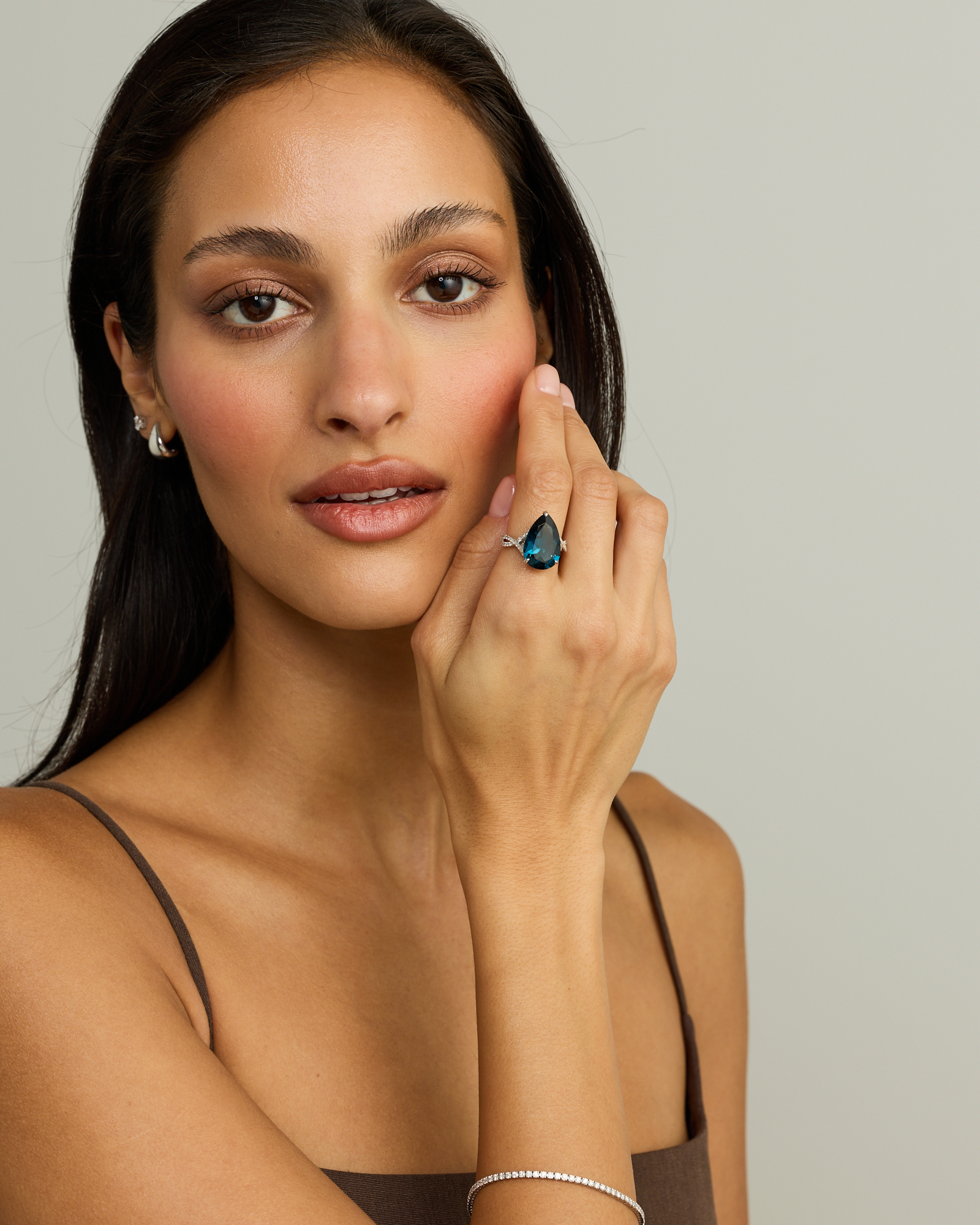 Pear Cut London Blue Topaz & 0.28 Carat TW Diamond Twist Ring 10kt Gold