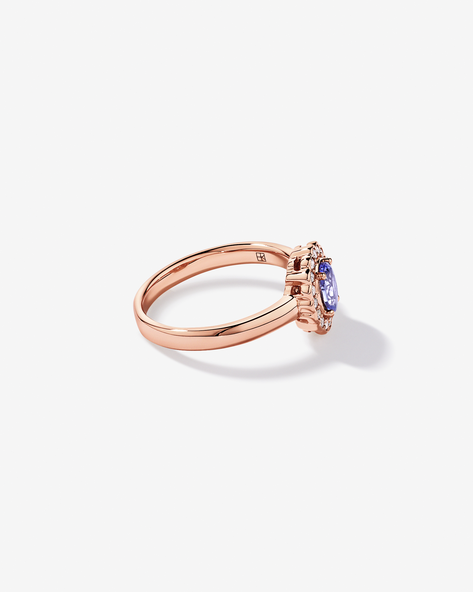Tanzanite & 0.15TW of Diamond Halo Ring 10kt Rose Gold