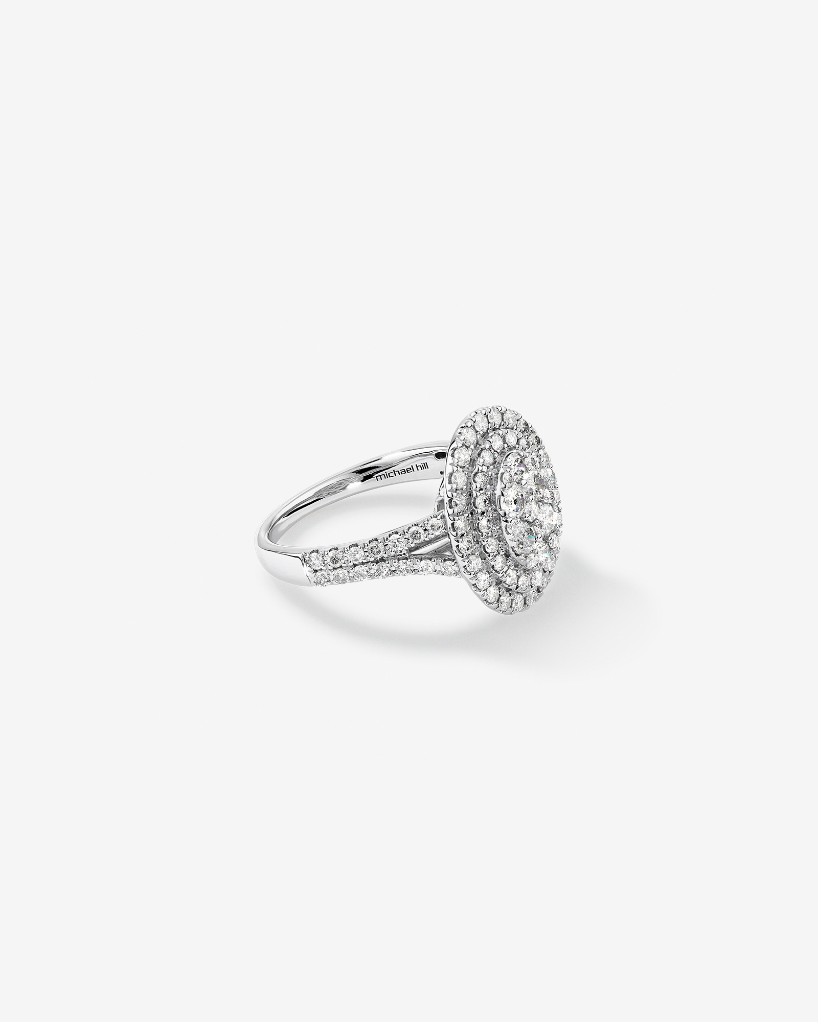 1.30 Carat TW Oval Shaped Cluster Halo Diamond Ring in 10kt White Gold