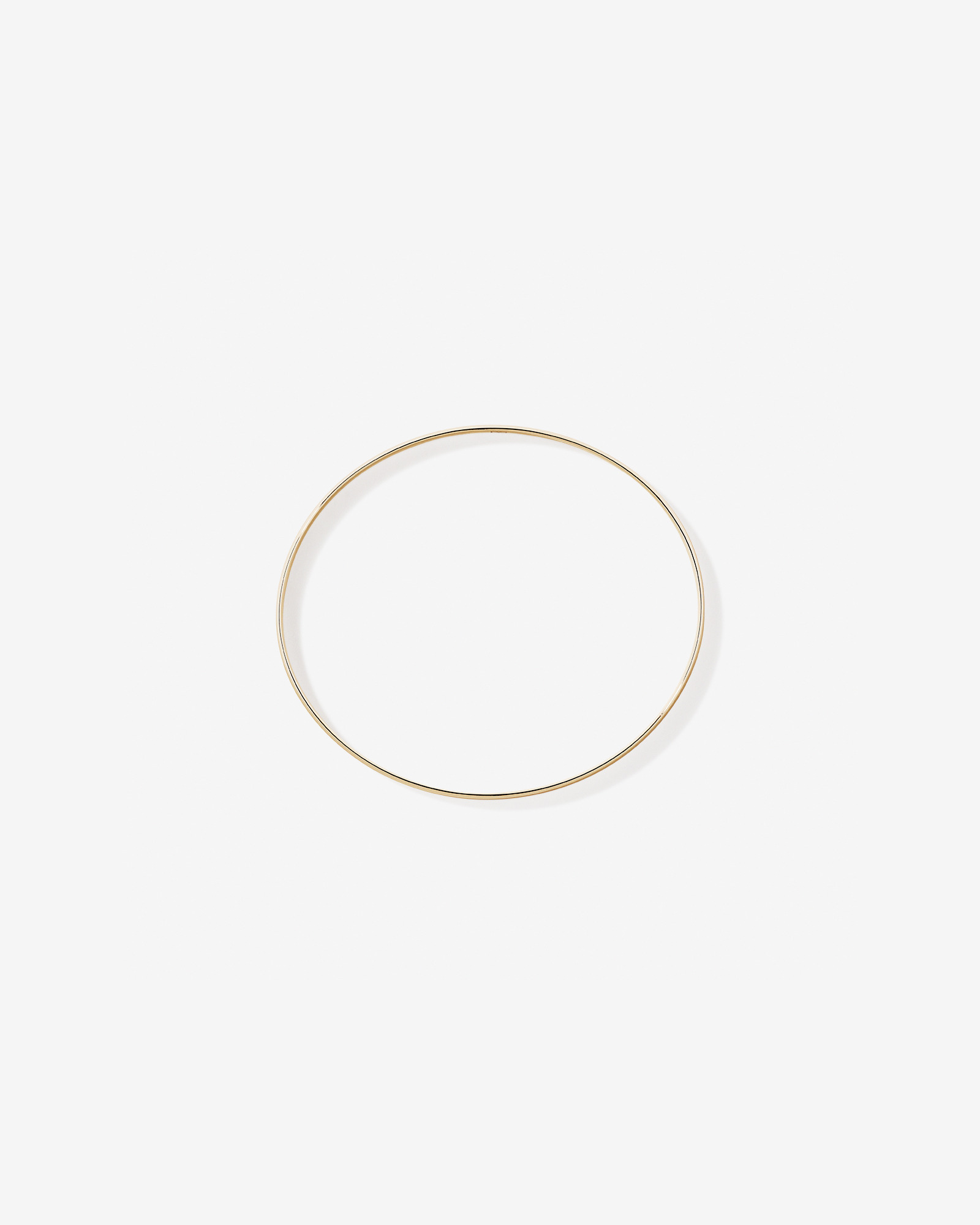 65mm (2.5") 5.7mm Width Solid Oval Bangle in 10kt Yellow Gold
