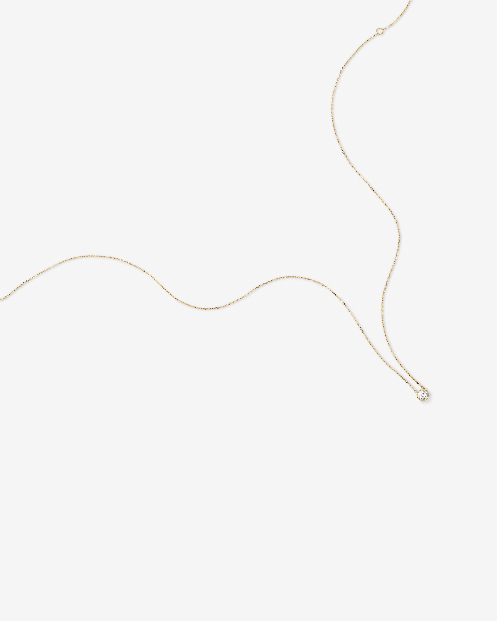 Pendentif rond TW à lunette brillante de 0,25 carat en or jaune 18 carats