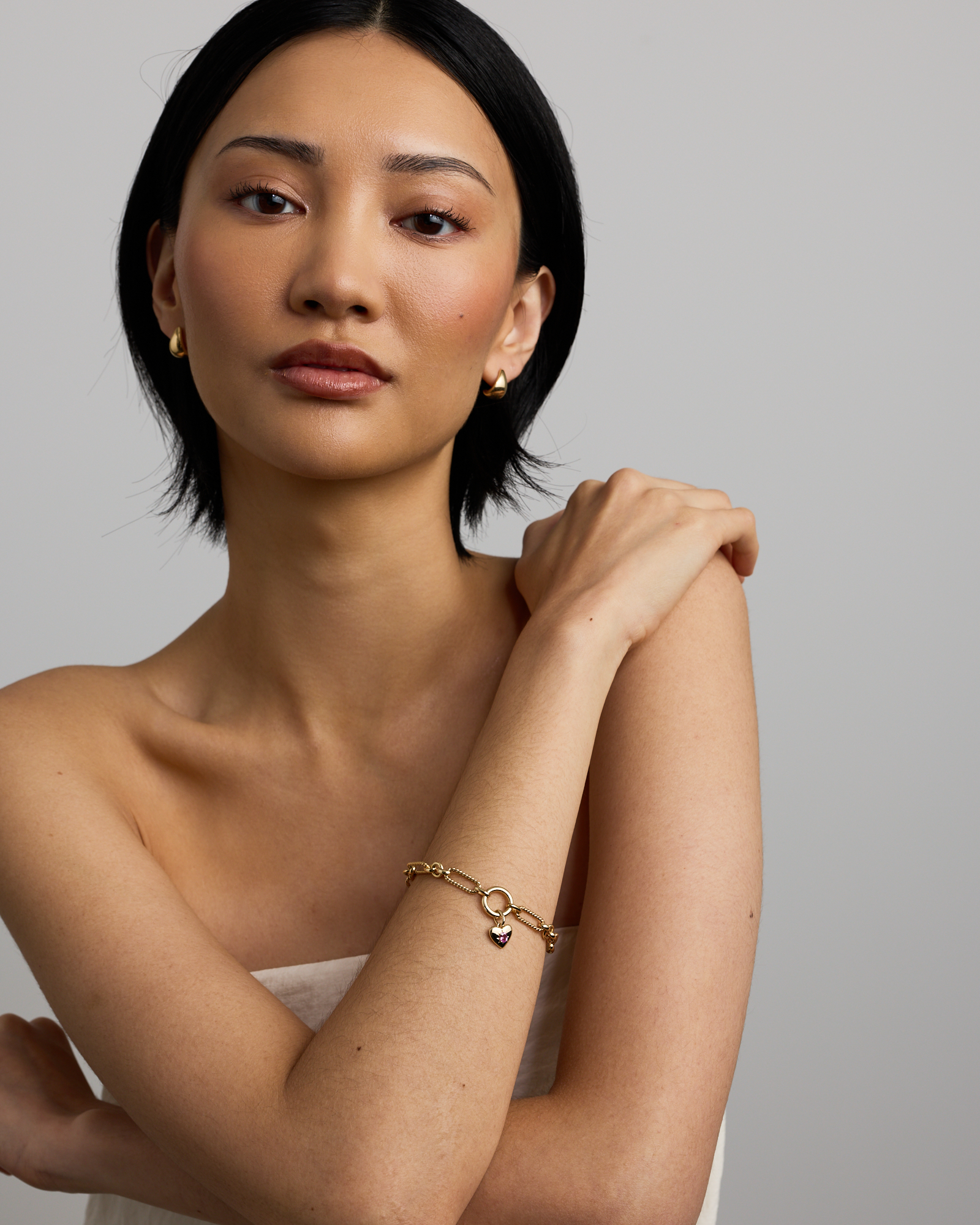 Heart Created Pink Sapphire Pendant in 10kt Yellow Gold